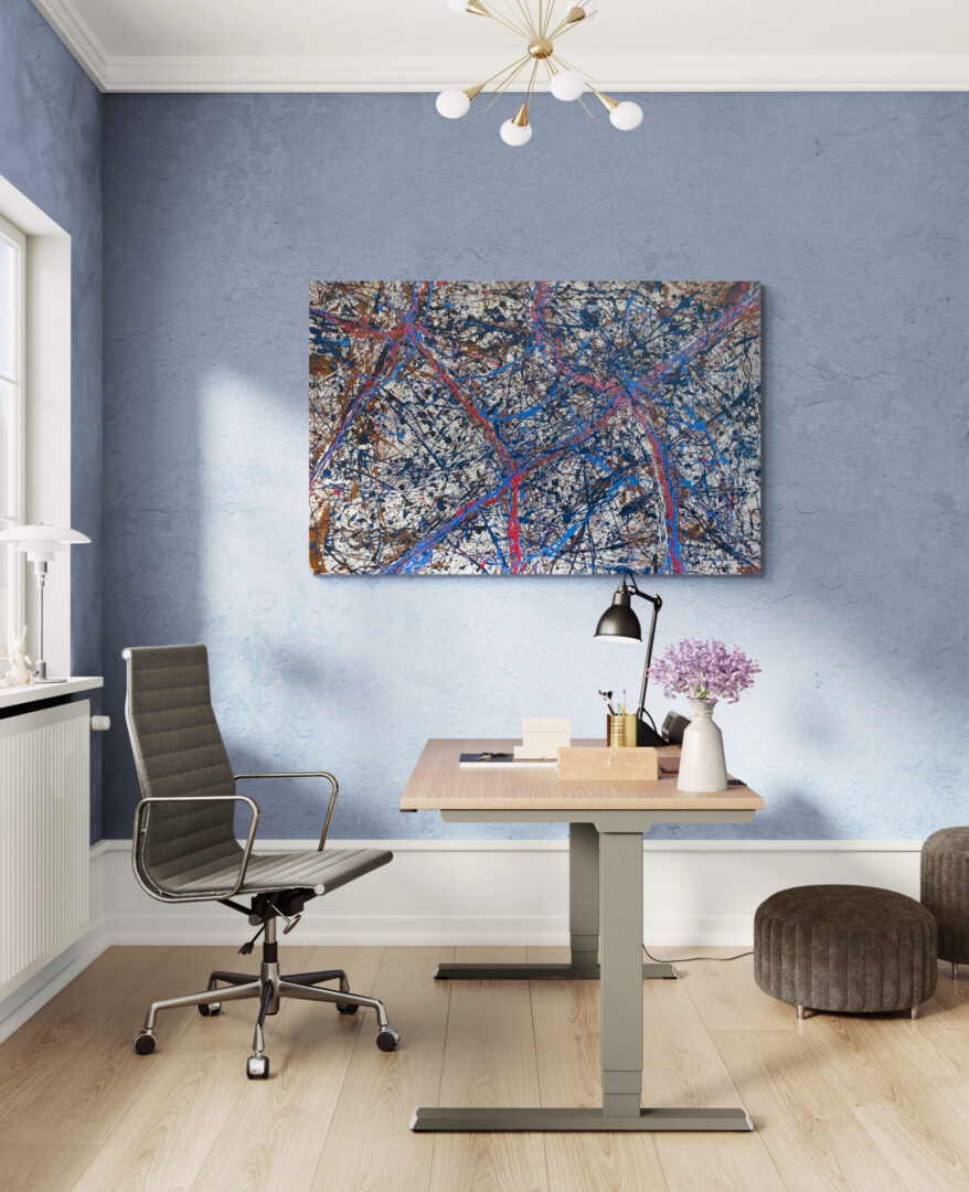 Modern office space with abstract art on the wall and sleek furniture.